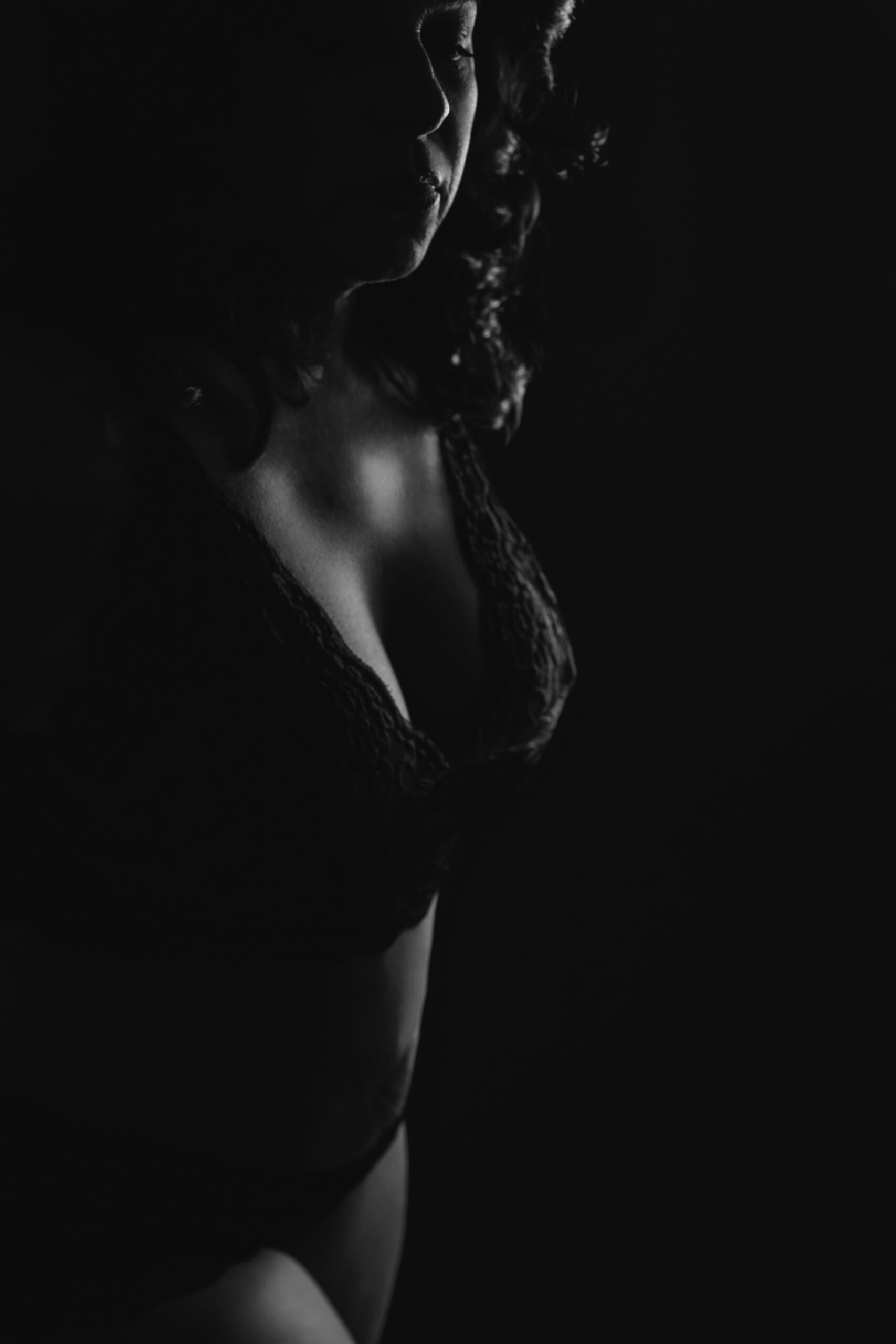 Silhouette of a woman in lingerie in a studio before she stays at luxury hotels austin