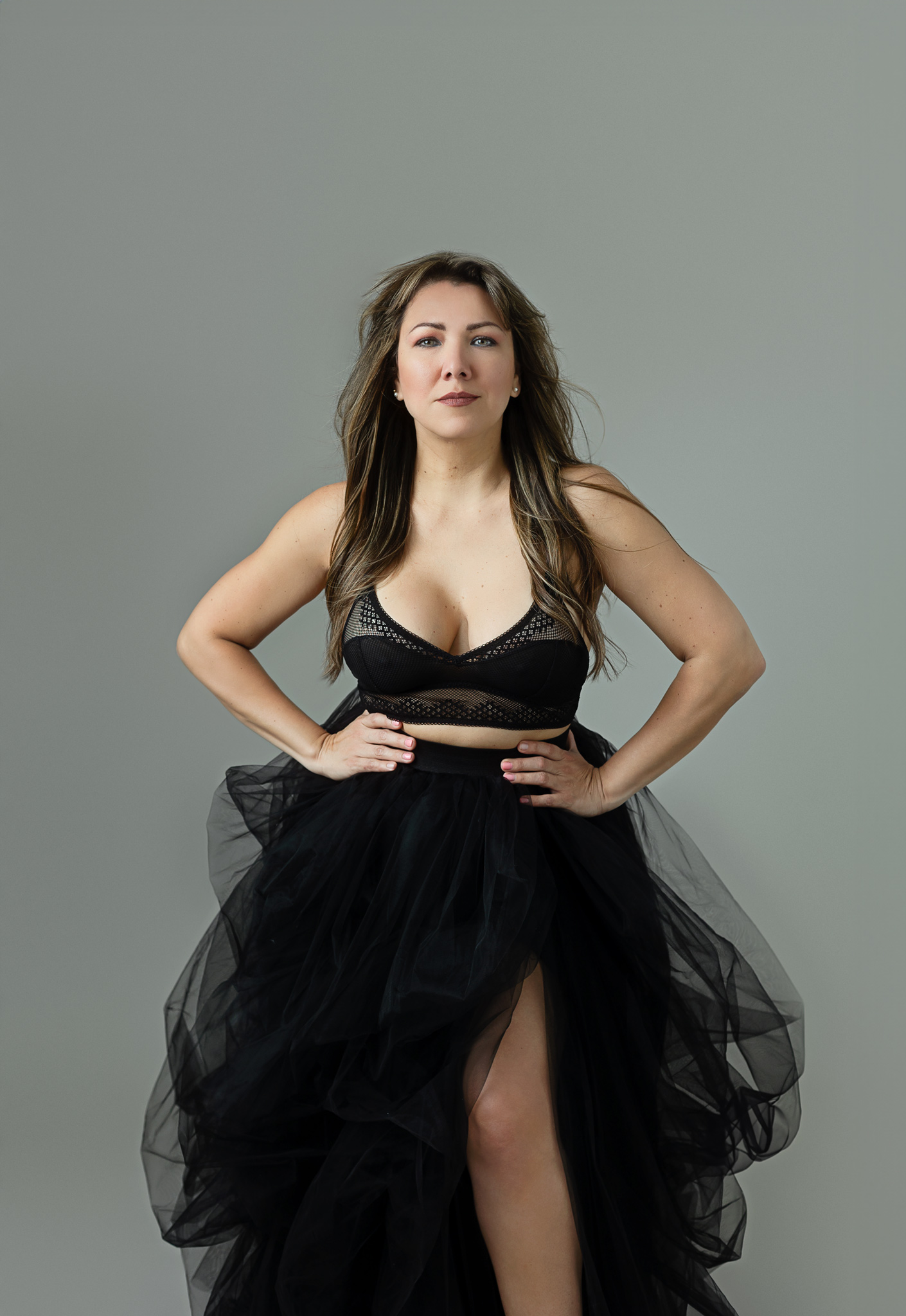 professional photography of woman celebrating her 40's wearing a black tulle skirt